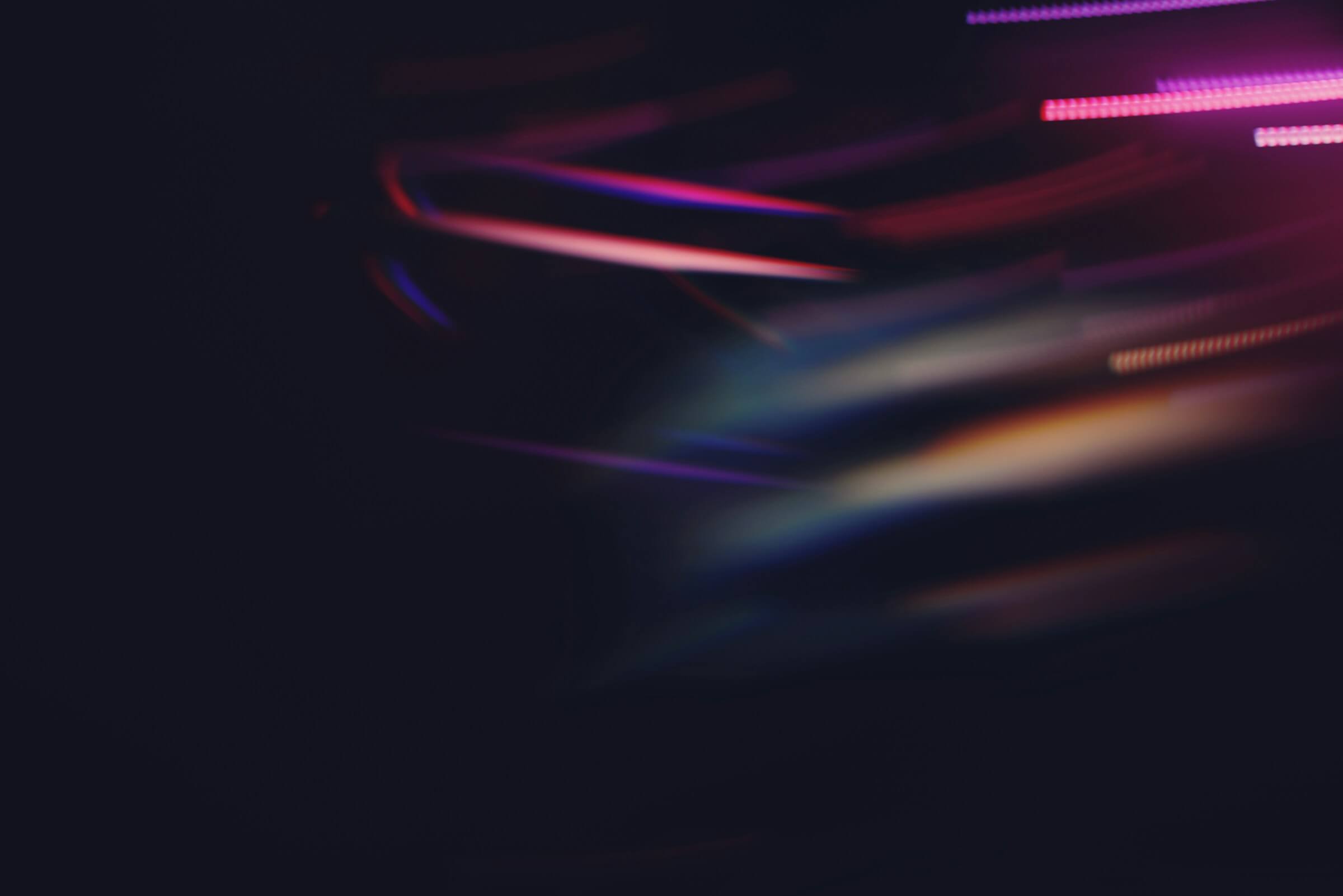 abstract-streaks-of-light-converging-in-a-dark-background