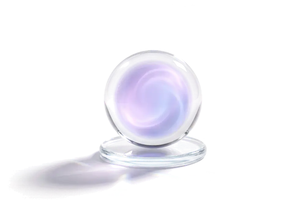 Glass orb with a soft lilac glow on a glass disc